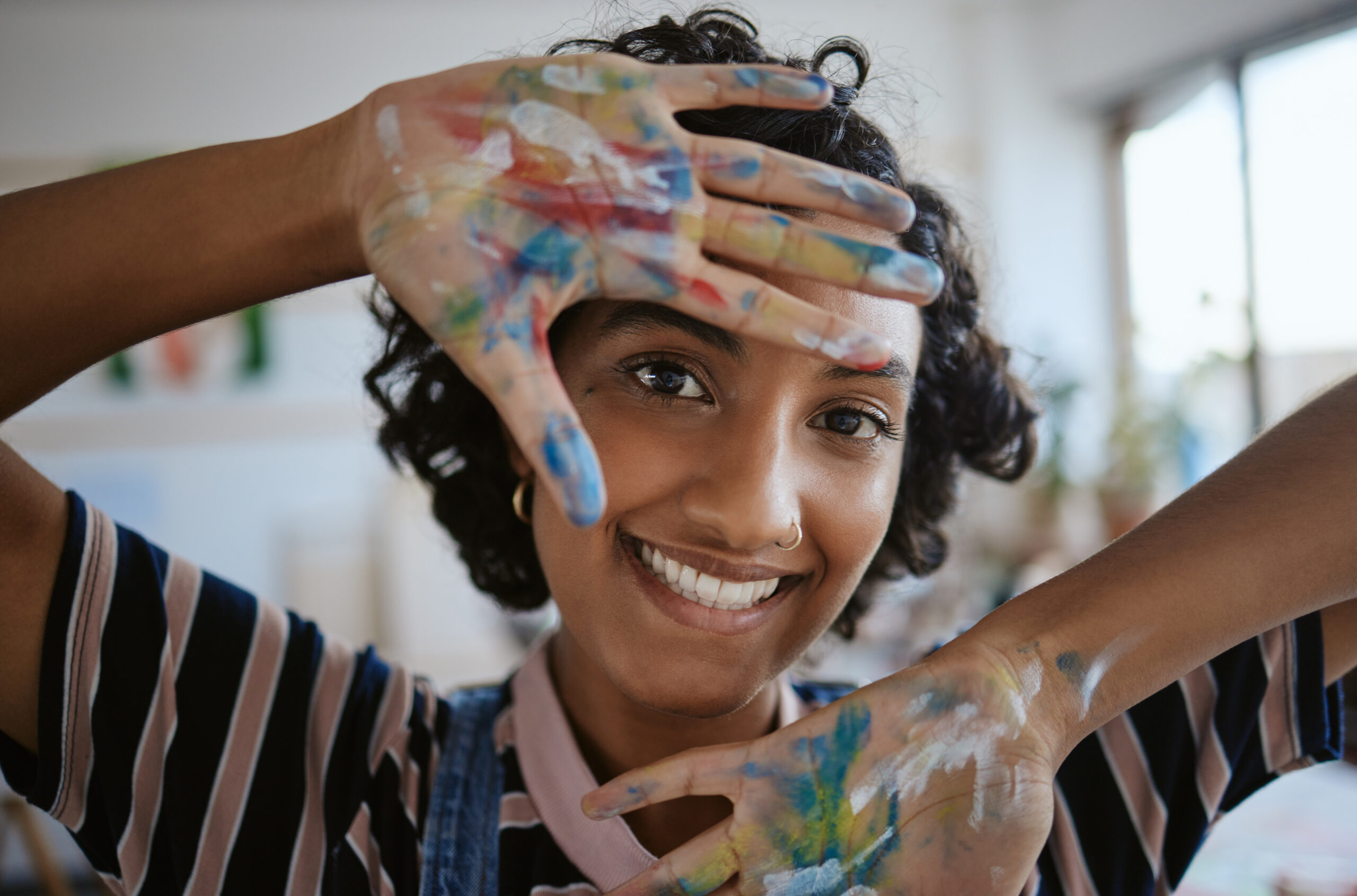 creative-portrait-hands-with-paint-on-happy-art-s-2022-12-14-00-52-06-utc